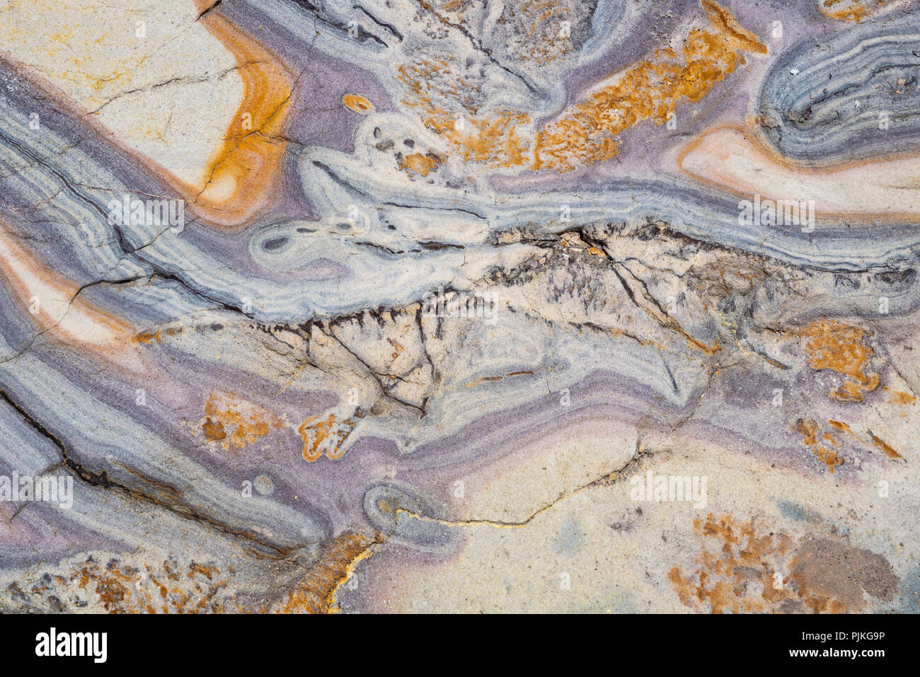 Colorful rock formation from a thermal spring in Yellowstone National Park, Wyoming. Stock Photo