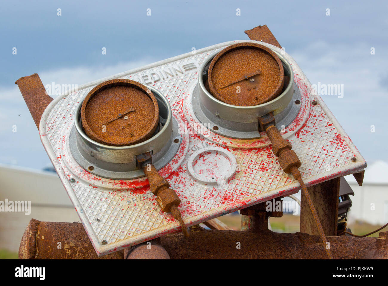 Iceland, junkyard, rusted speedometer with pointers Stock Photo