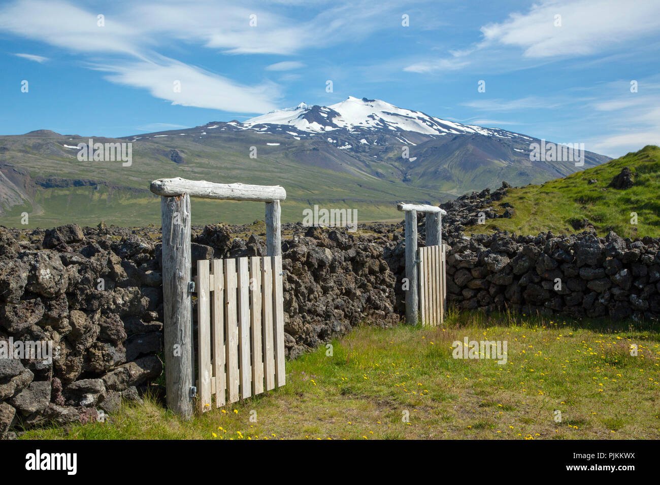Iceland, Snaefellsjökull volcano, Snaefellsnes peninsula, sheep shed, stone walls, wooden gates, nice weather Stock Photo