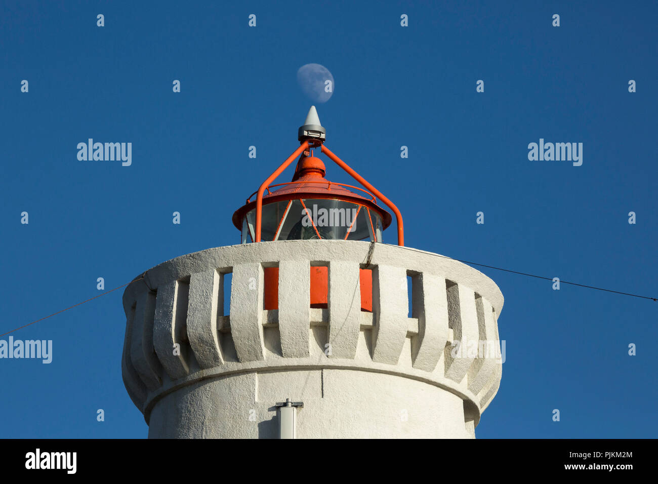 Iceland, Reykjanes Lighthouse near Gardur, moon on the top Stock Photo