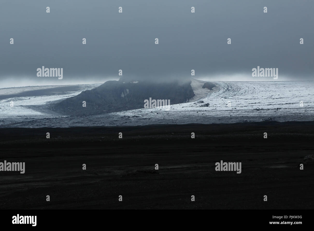 Iceland, Maellifellsandur, Myrdals glacier in the mist, ghostly, threatening Stock Photo