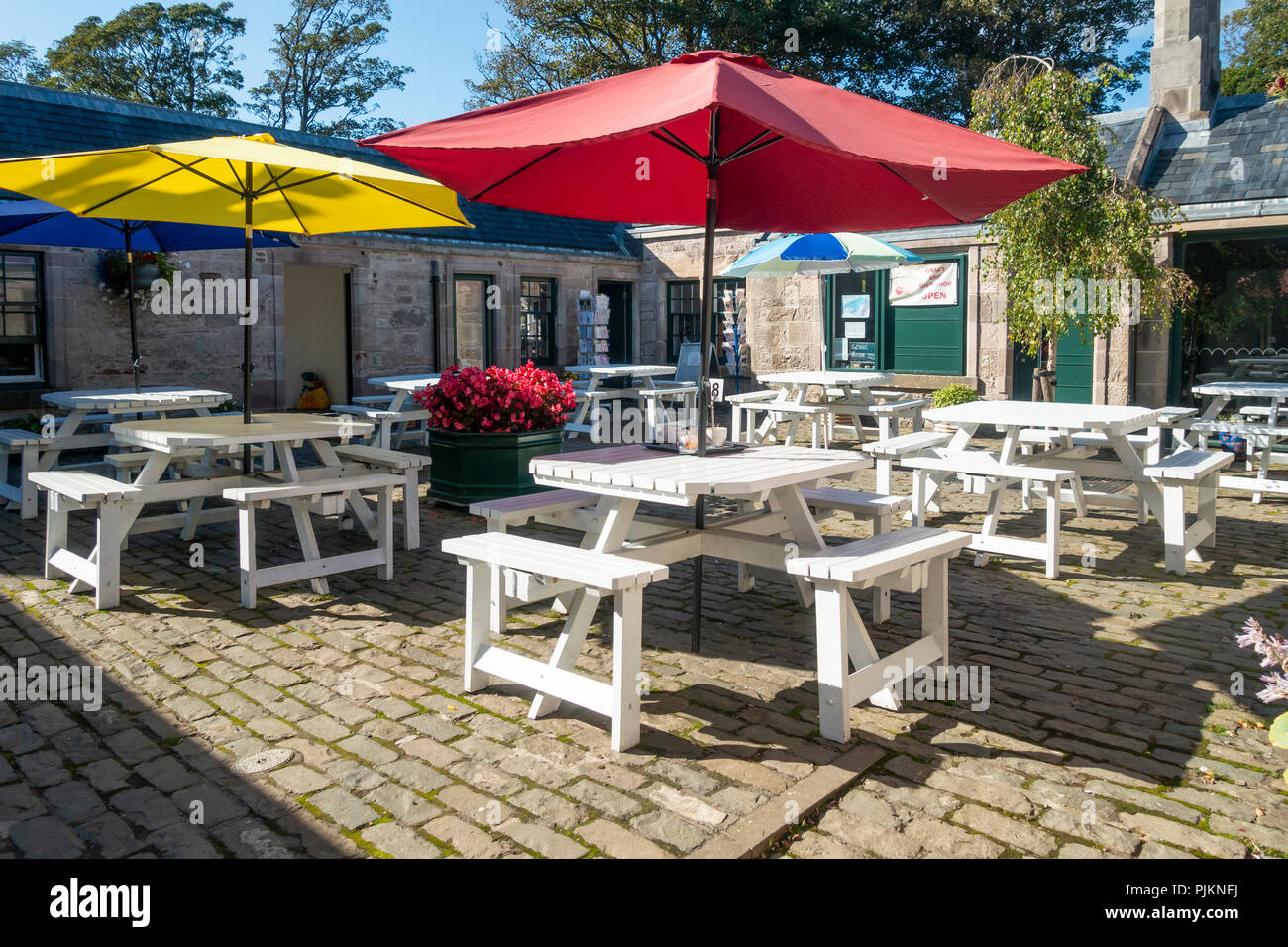 The cafe-courtyard of The Garrison in Millport, Isle of Cumbrae, Scotland. The Garrison was restored after a fire in 2001, and the courtyard was added Stock Photo