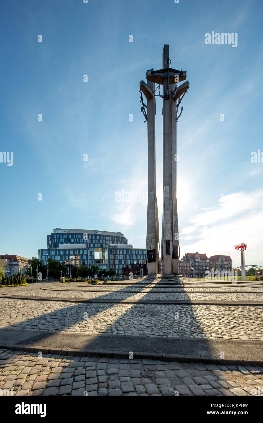 Monument to the fallen shipyard workers, Pomnik Poleglych Stoczniowców on the square in front of the main gate of the Gdansk shipyard, Gdansk, European Center of Solidarity, Gdansk, Baltic Sea coast, Baltic Sea, pomorskie, Pomeranian Voivodeship, Poland Stock Photo