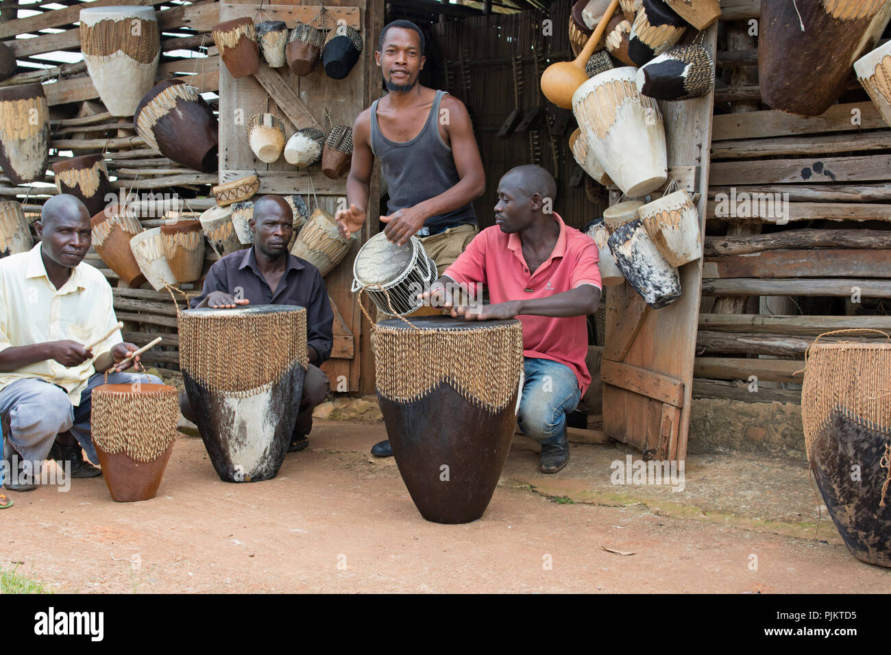 Royal Drum Makers, Drum Drums Sellers, Drumming, Drummers in Mpambire, Uganda, East Africa Stock Photo