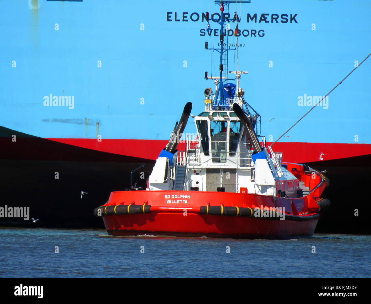 Harbor tug on the Elbe in Hamburg Stock Photo