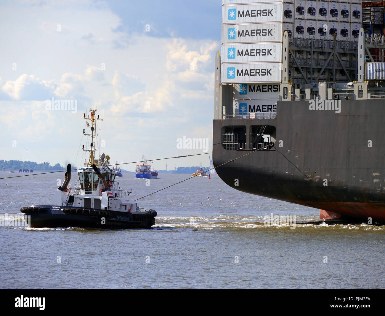 Harbor tug on the Elbe in Hamburg Stock Photo