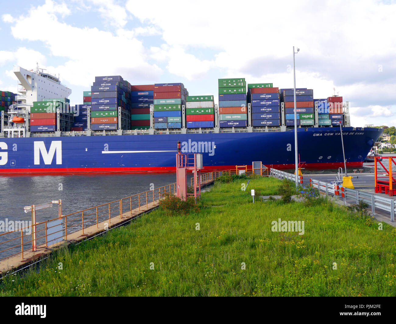 Container ship on the Elbe Stock Photo