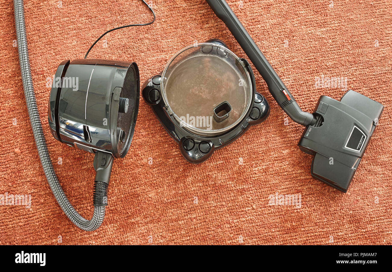 Water vacuum cleaner opened, on carpet, top view Stock Photo