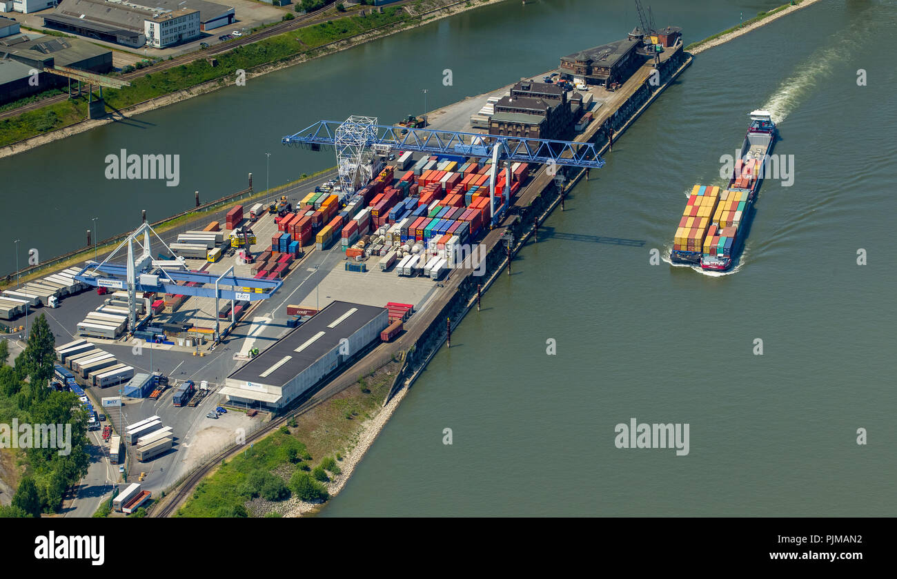 Container ship with docked slipcase upstream on Rhine loaded with containers at Kredelder Container harbour, Krefeld, Ruhr area, North Rhine-Westphalia, Germany Stock Photo