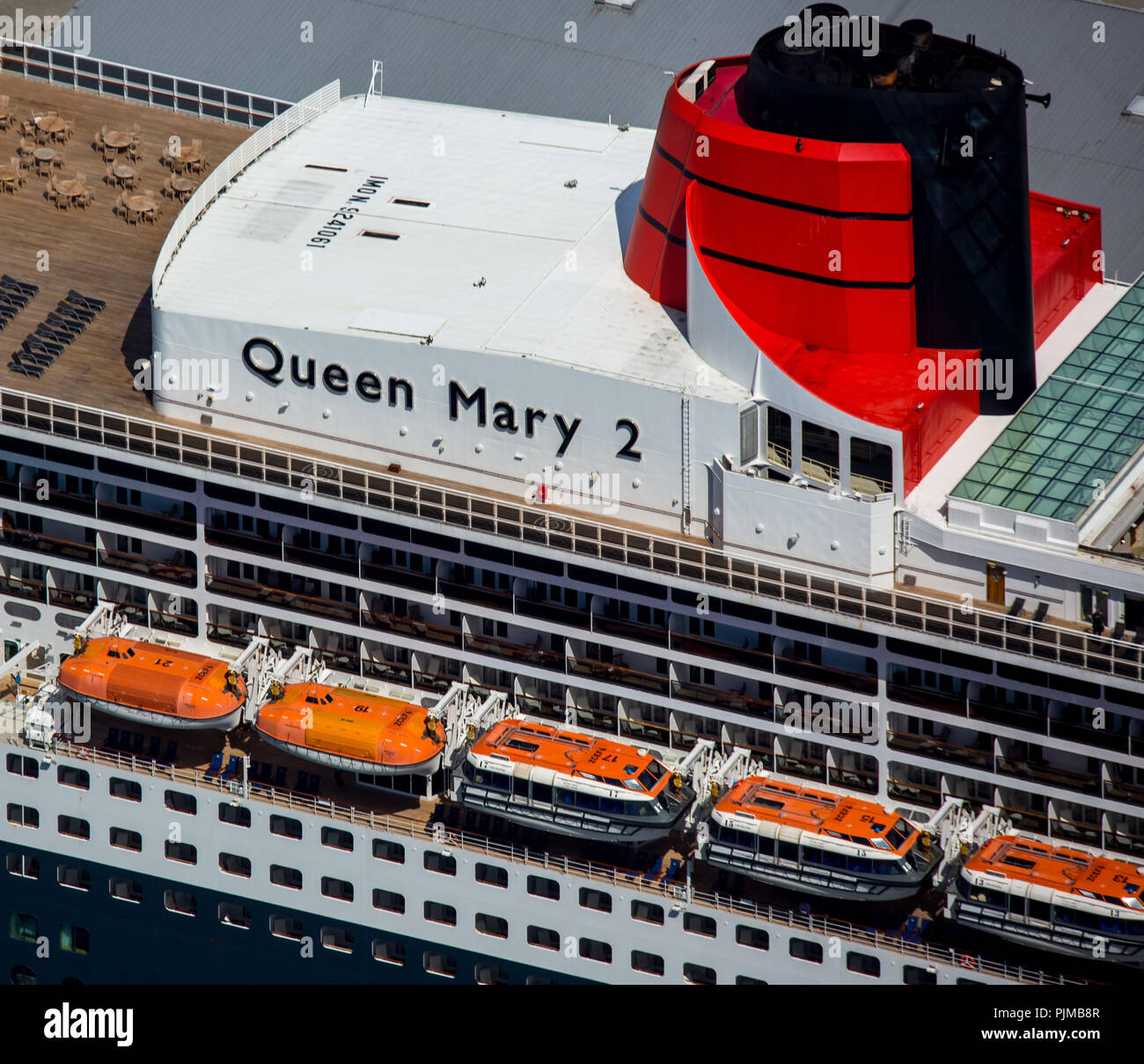 Structures with chimney and lifeboats, cruise terminal, Unilever House cruise ship Queen Mary 2, Port of Hamburg, Elbe, Hamburg, Free and Hanseatic City of Hamburg, Hamburg, Germany Stock Photo