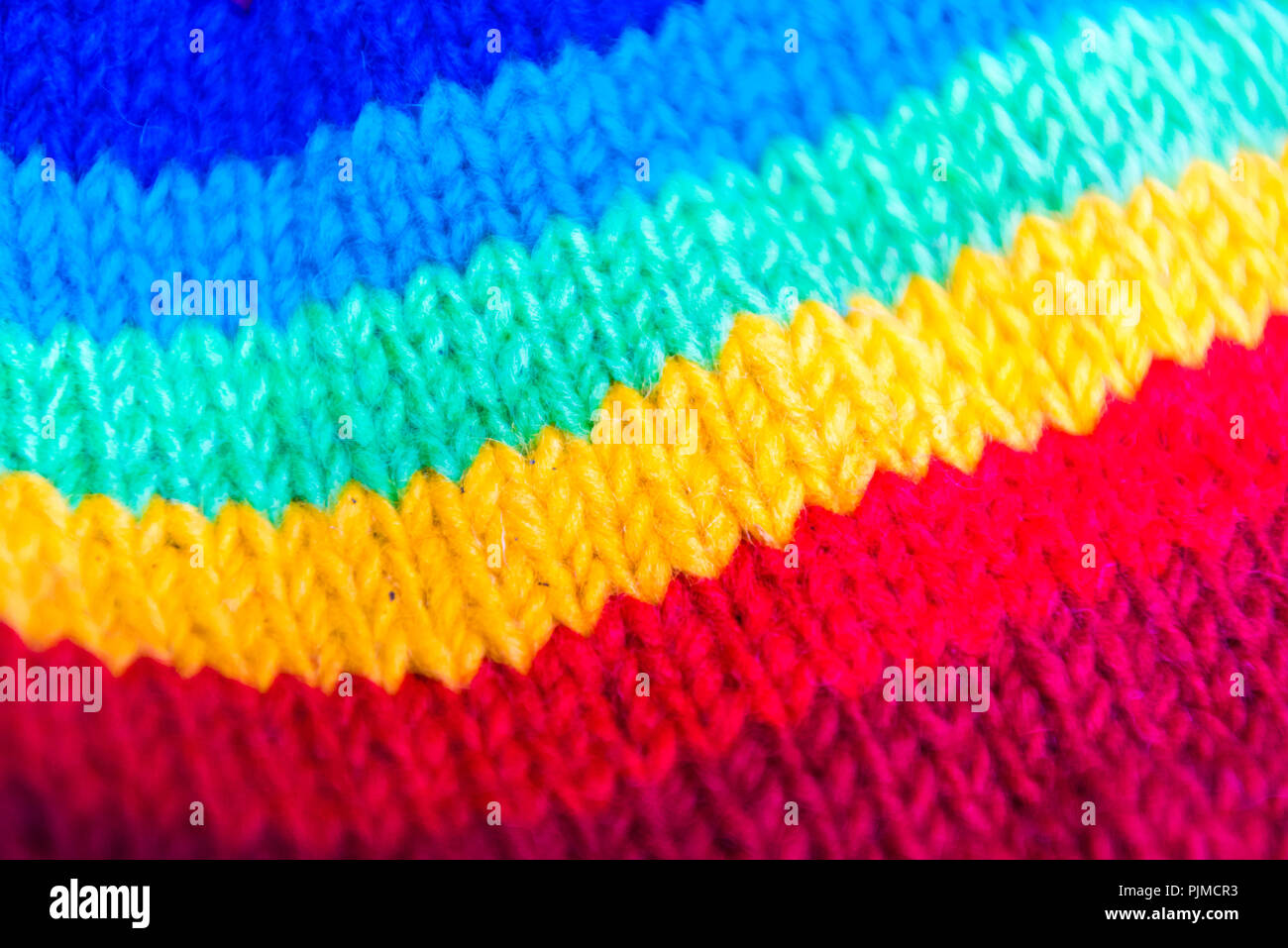 Close-up on colourful hand knitted hat Stock Photo