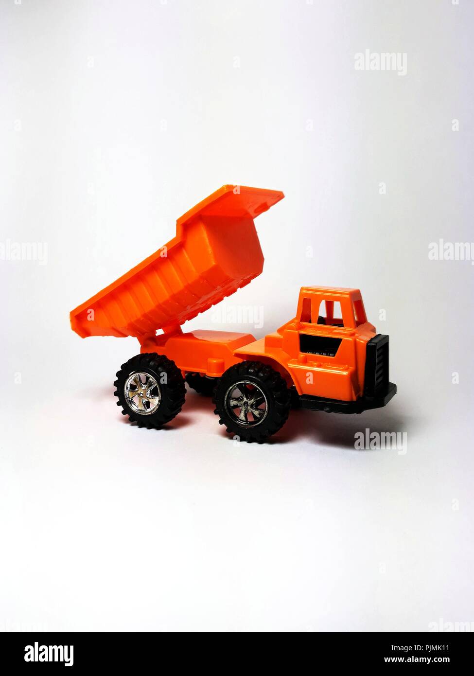 dump truck isolated on white background Stock Photo - Alamy