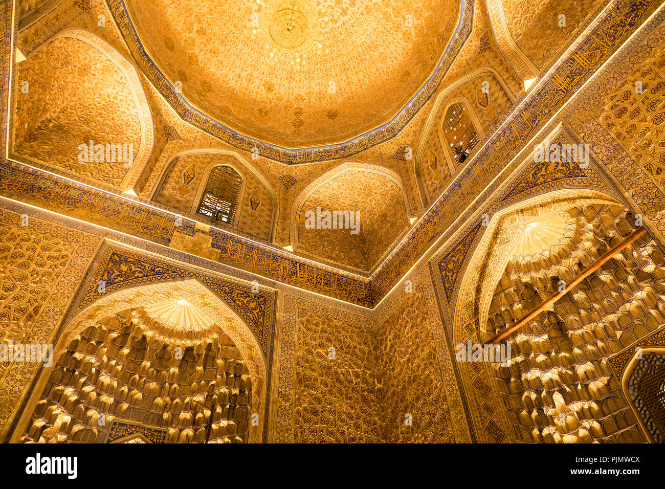 SAMARKAND, UZBEKISTAN -SEPTEMBER 01, 2018: Amir Temur (Tamerlan) tomb in Samarkand, Uzbekistan. Wall's and ceiling golden mosaic decoration in Persian Stock Photo