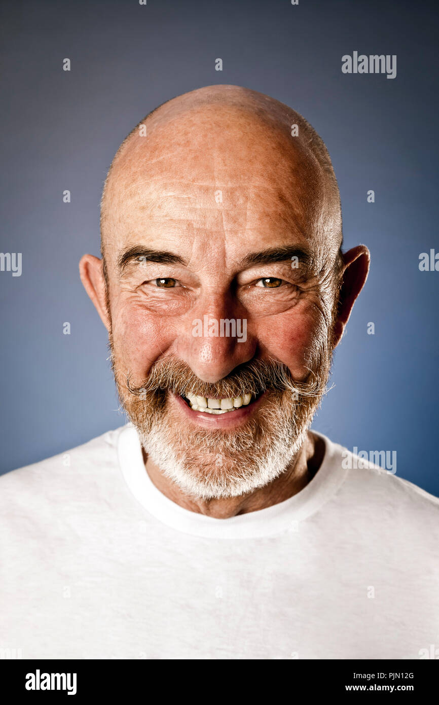 An old man with a grey beard Stock Photo