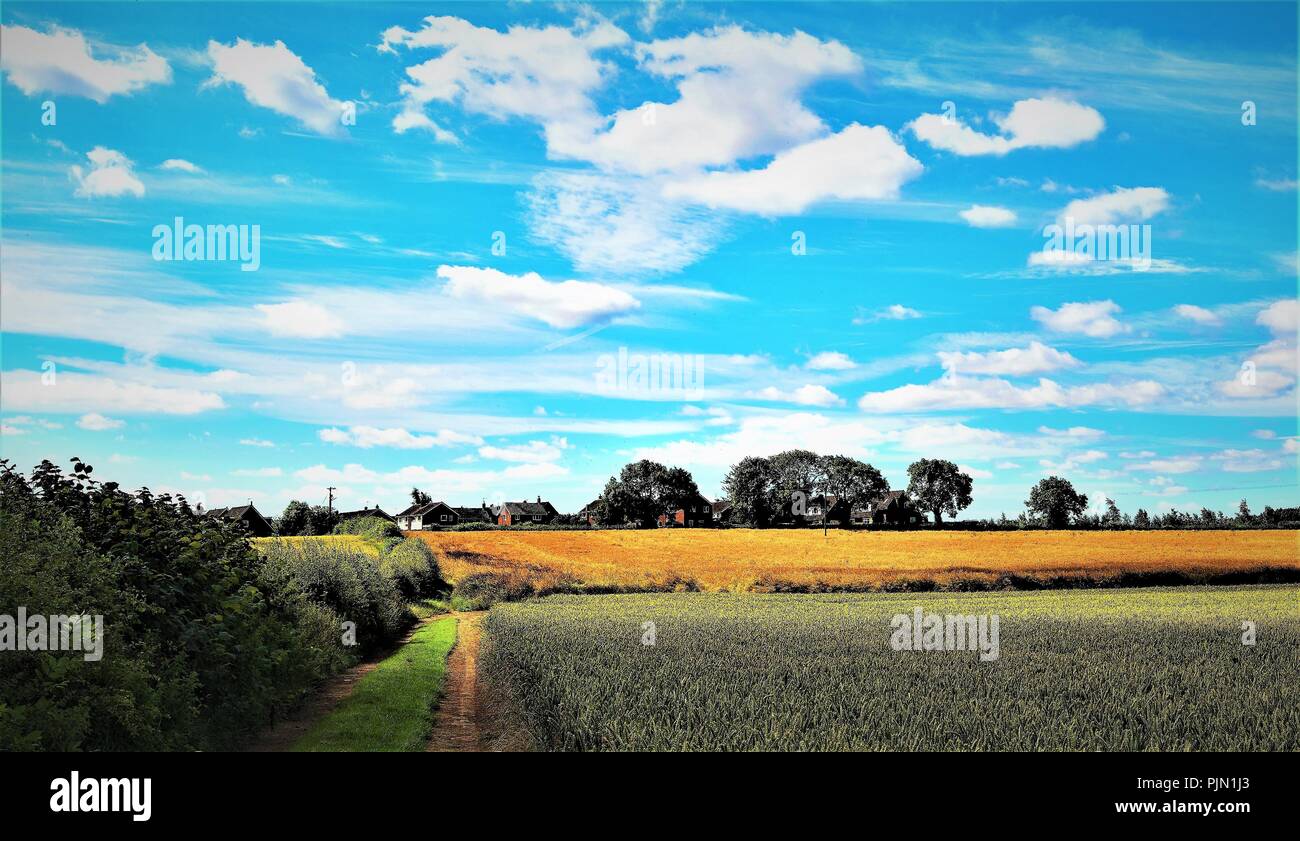 Summer cloud bursts over Sprotbrough farmland, in Doncaster, South Yorkshire, England. Stock Photo