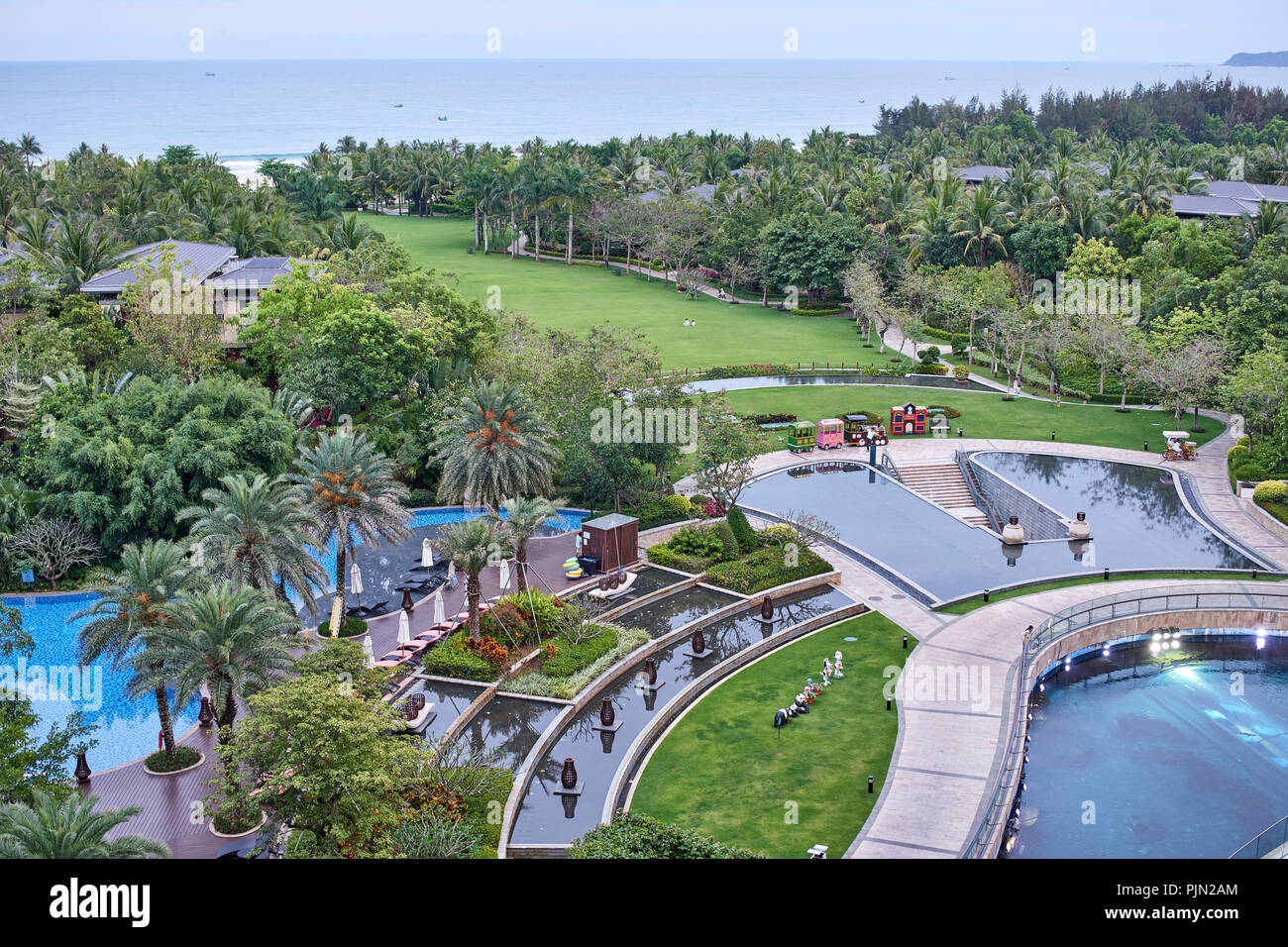 Intercontinental Hotel Sanya Haitang Bay Resort, View over gardens bay and swiming pool Stock Photo