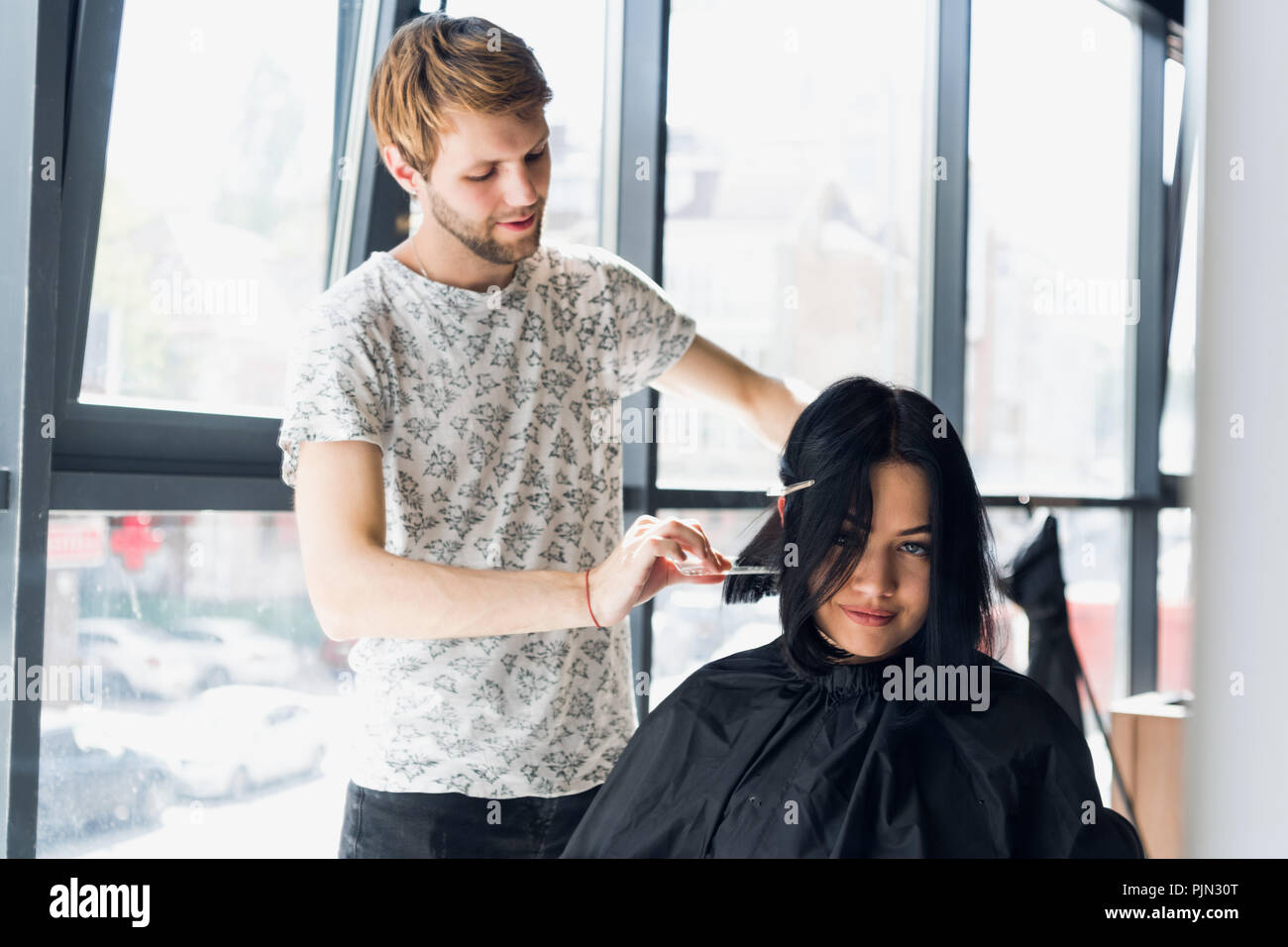 Going for a change of style. Young beautiful woman discussing