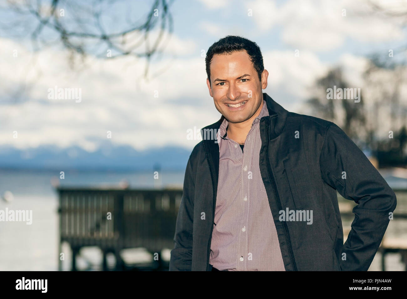 A young man in the lake, Ein junger Mann am See Stock Photo