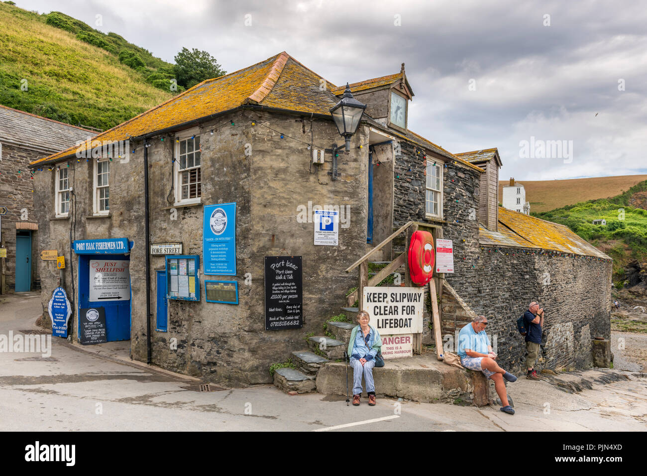 One of the many historic buildings found at the entrance to the slipway at Port Isaac in North Cornwall, made famous by the television series 'Doc Mar Stock Photo