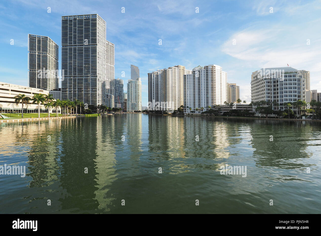 Miami Key Bridge Buildings of the City of Miami and Brickell Key and their reflections ...
