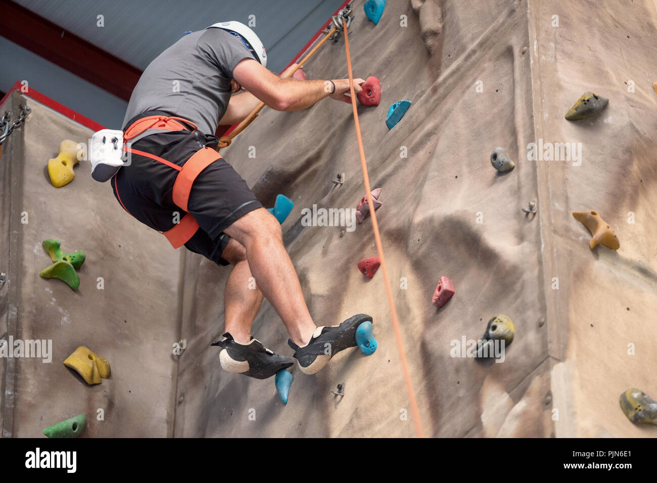 Climbing wall indoor adult male hi-res stock photography and images - Alamy