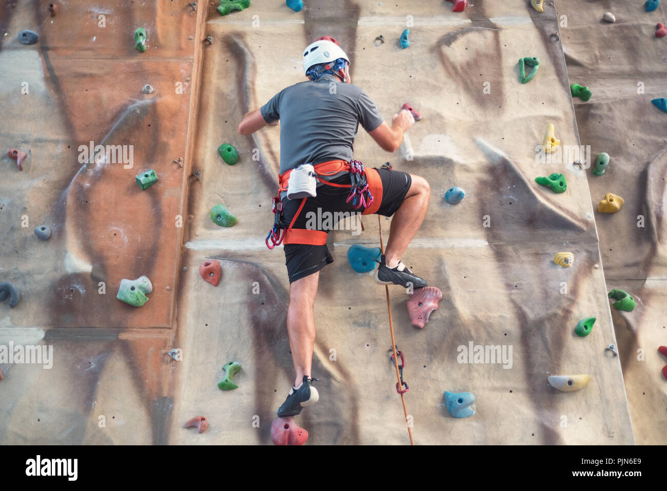 Rock climbing belaying indoors hi-res stock photography and images - Alamy