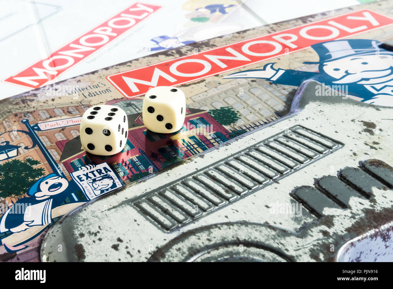 Monopoly Board Game close up with the box, board and dices. The classic