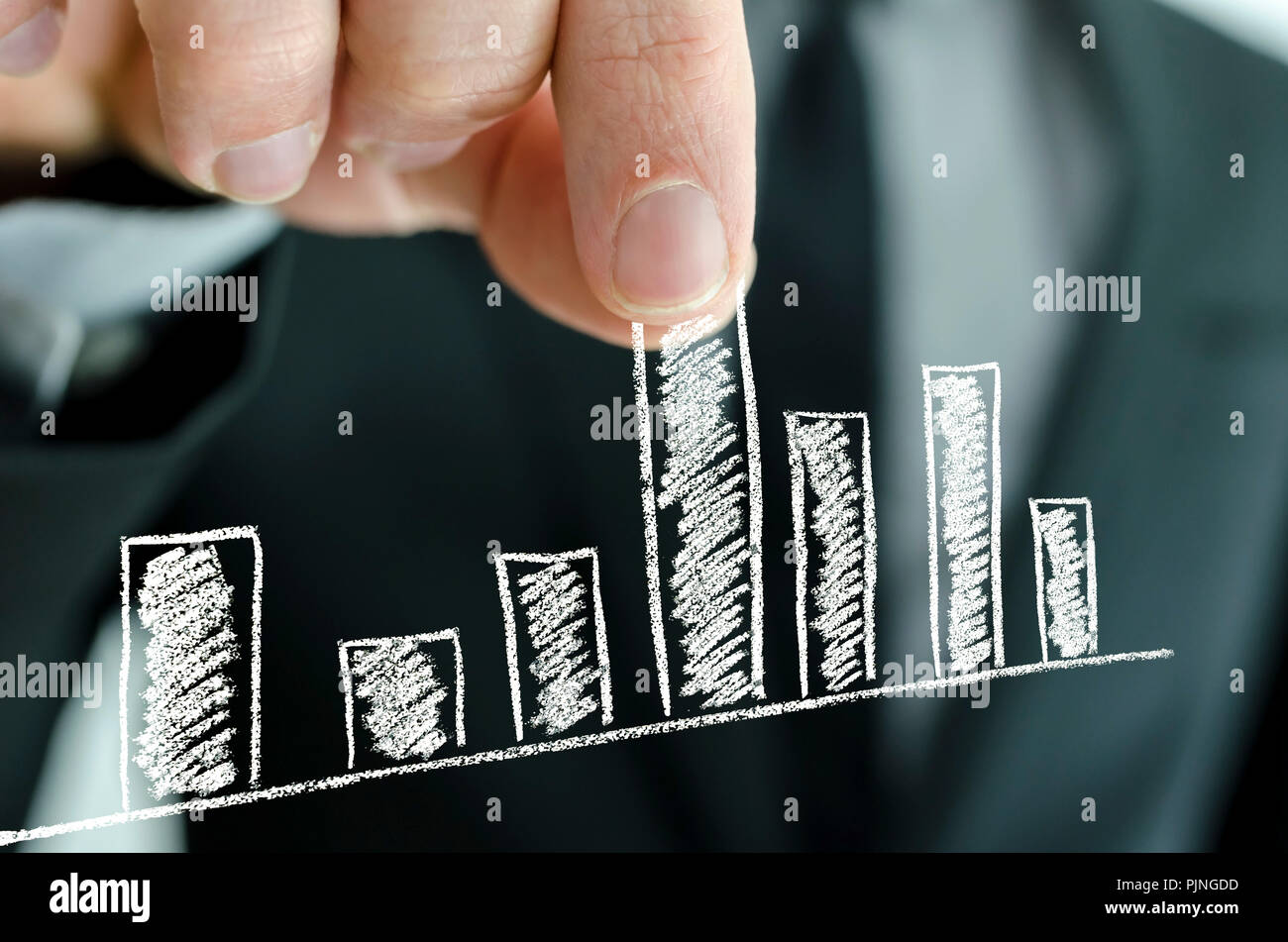 Pull Up Numbers Graph Businessman pulling graph column upwards on a virtual screen Stock ...