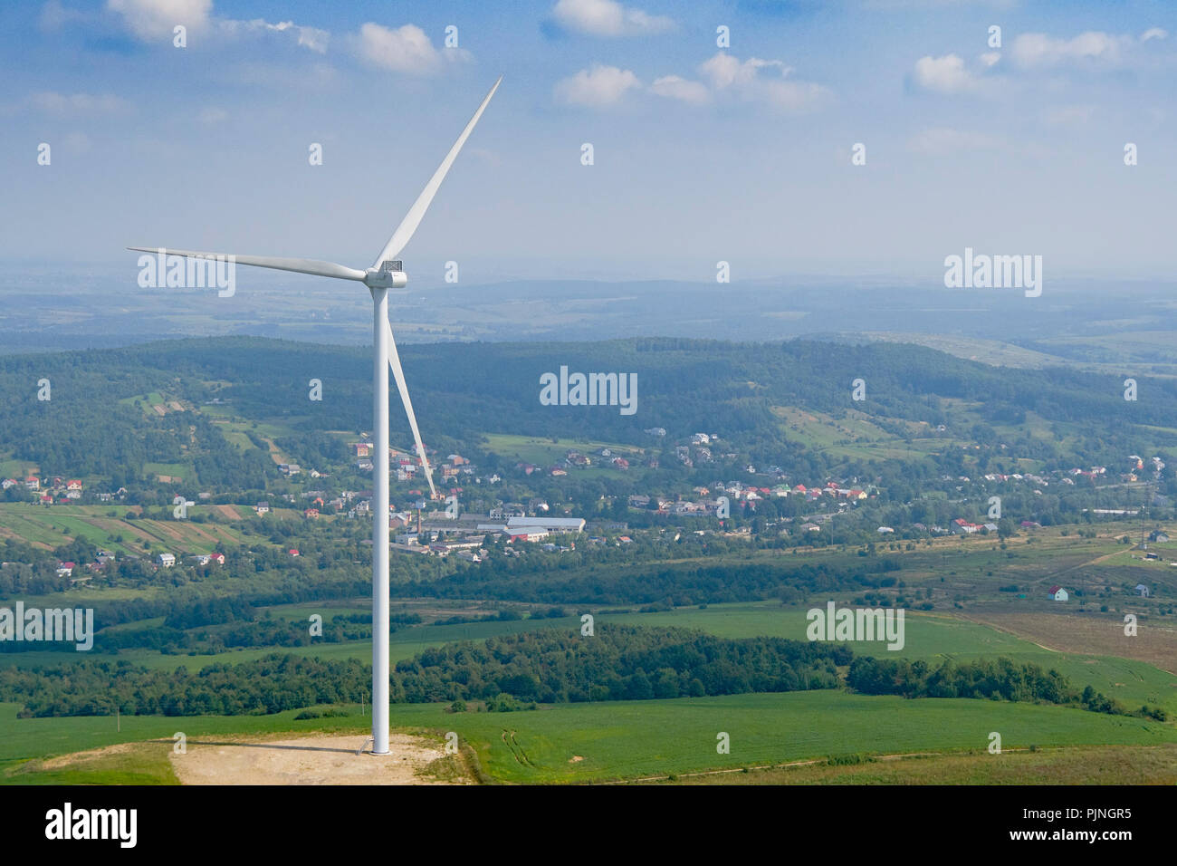 Wind turbine from aerial view - Sustainable development, environment friendly, renewable energy concept. Stock Photo