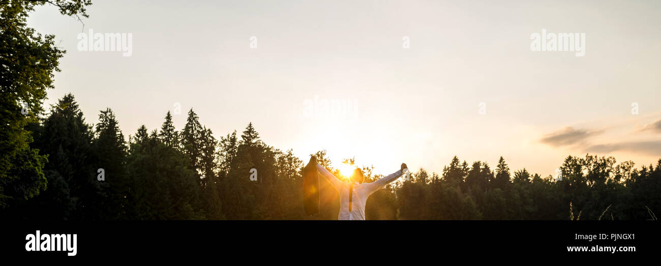 Man backlit standing suit hi-res stock photography and images - Alamy