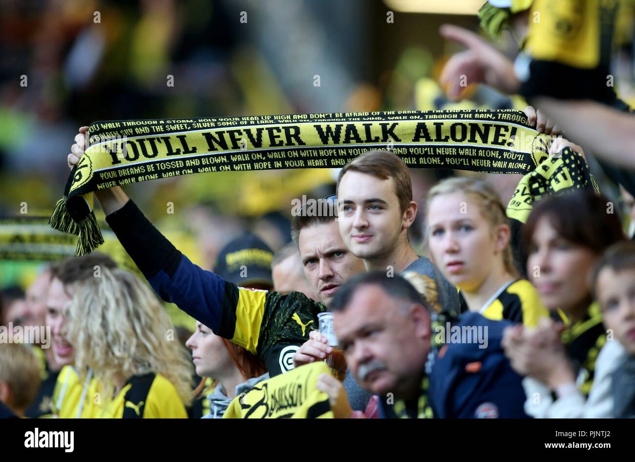 Dortmund, Germany. 07th Sep, 2018. firo: 07.09.2018, Football, BVB,  Borussia Dortmund, Farewell game Roman Weidenfeller, Season 2018/2019,  Sudtribune Suedtribuene, Fans, Scarves, Scarf, Flags, You never walk alone,  Scarf, | usage worldwide Credit: