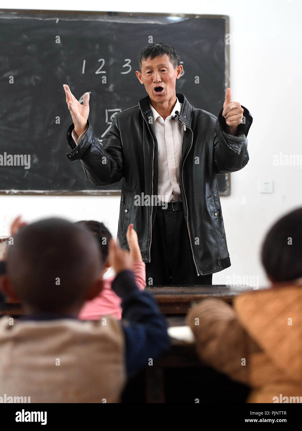 Yunnan Province, China. 8th Sept 2018. Wang Zhengxiang teaches at Ayiyang Primary School in Sanmeng Village of Luquan Yi and Miao Autonomous County, southwest China's Yunnan Province, Sept. 6, 2018. One teacher, eight students, none was and will be given up thanks to rural teacher Wang Zhengxiang. Credit: Xinhua/Alamy Live News Stock Photo