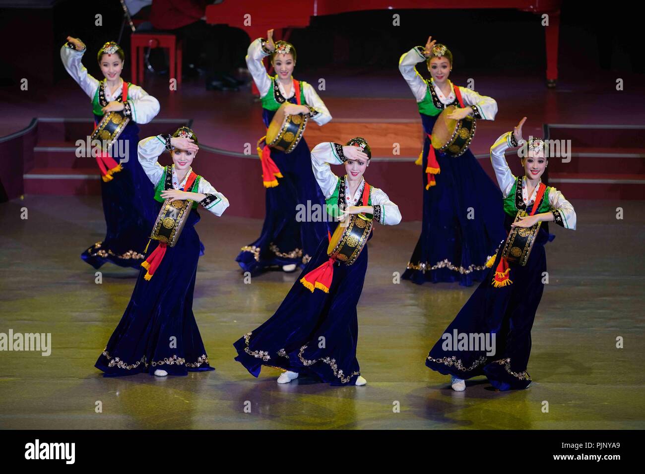Pyongyang, DPRK. 8th Sep, 2018. Dancers perform during an art performance celebrating the 70th anniversary of the founding of the Democratic People's Republic of Korea (DPRK), in Pyongyang, DPRK, Sept. 8, 2018. Credit: Xing Guangli/Xinhua/Alamy Live News Stock Photo