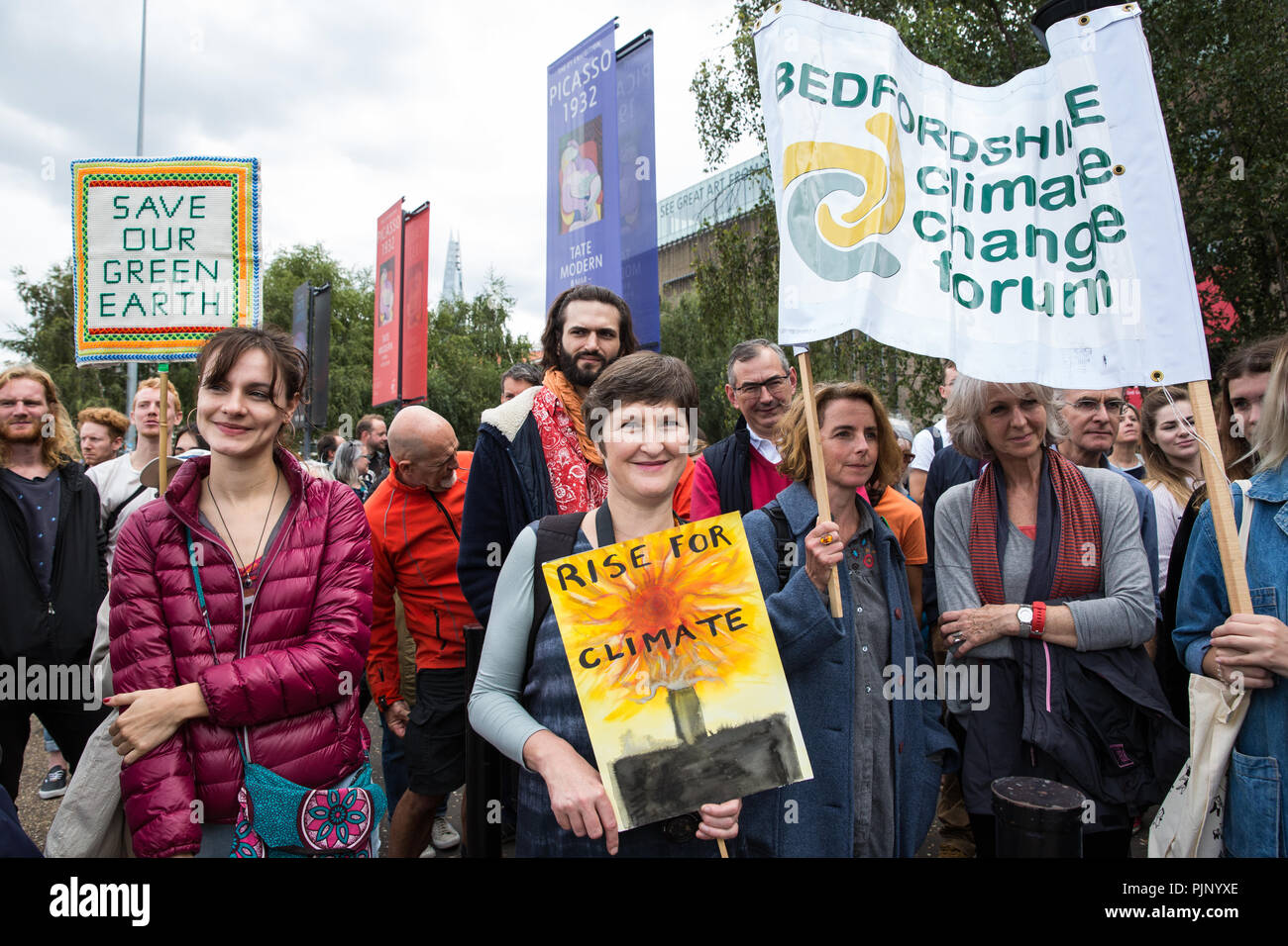 London, UK. 8th Sep, 2018. Environmental campaigners hold a rally outside Tate Modern in support of Rise For Climate, a global day of action involving hundreds of rallies in cities and towns around the world to highlight climate change and call on local leaders to commit to helping the world reach the goals of the Paris Climate Agreement. Credit: Mark Kerrison/Alamy Live News Stock Photo