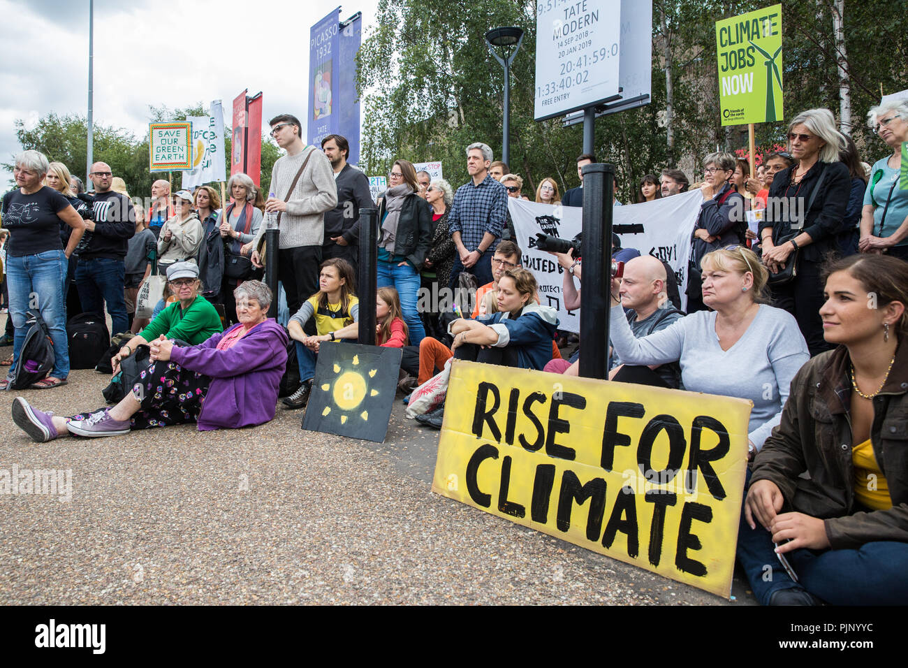 London, UK. 8th Sep, 2018. Environmental campaigners hold a rally outside Tate Modern in support of Rise For Climate, a global day of action involving hundreds of rallies in cities and towns around the world to highlight climate change and call on local leaders to commit to helping the world reach the goals of the Paris Climate Agreement. Credit: Mark Kerrison/Alamy Live News Stock Photo