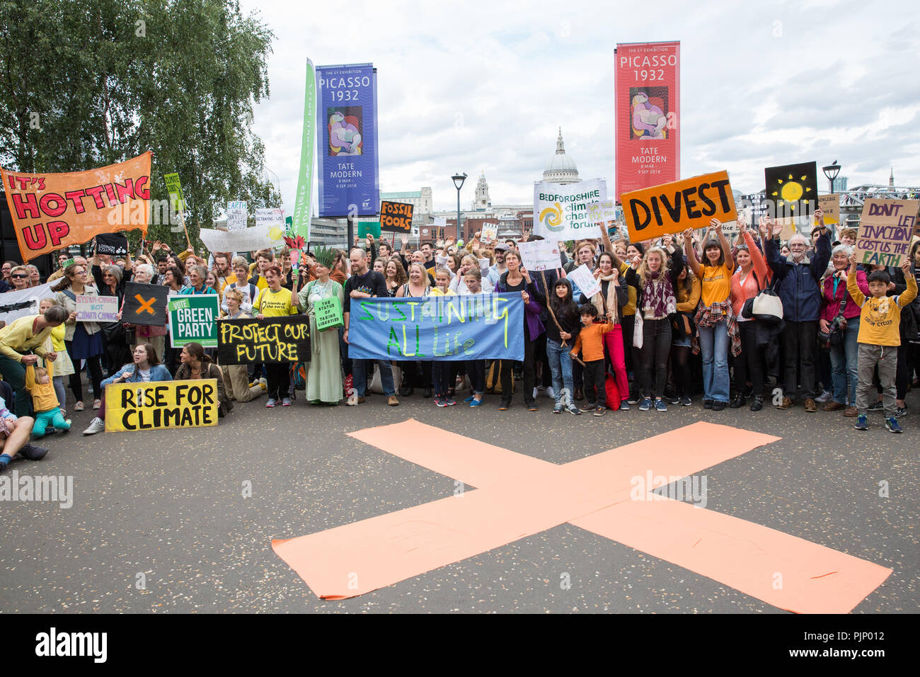 London, UK. 8th Sep, 2018. Environmental campaigners hold a rally outside Tate Modern in support of Rise For Climate, a global day of action involving hundreds of rallies in cities and towns around the world to highlight climate change and call on local leaders to commit to helping the world reach the goals of the Paris Climate Agreement. Credit: Mark Kerrison/Alamy Live News Stock Photo