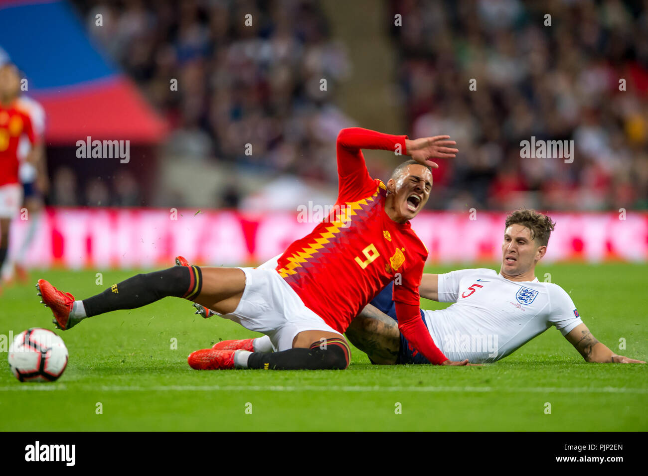 Rodrigo Moreno of Spain is fouled by John Stones of England during the UEFA Nation League, Group 4, League A match between England and Spain at Wembley Stadium, London, England on 8 September 2018. 8th Sep, 2018. Photo by Salvio Calabrese Credit: AFP7/ZUMA Wire/Alamy Live News Stock Photo