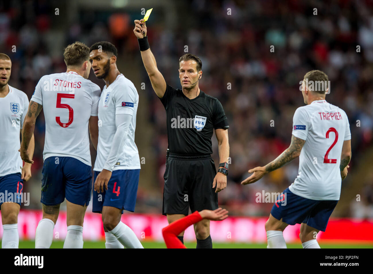 John Stones of England receives a yellow card during the UEFA Nation League, Group 4, League A match between England and Spain at Wembley Stadium, London, England on 8 September 2018. 8th Sep, 2018. Photo by Salvio Calabrese Credit: AFP7/ZUMA Wire/Alamy Live News Stock Photo