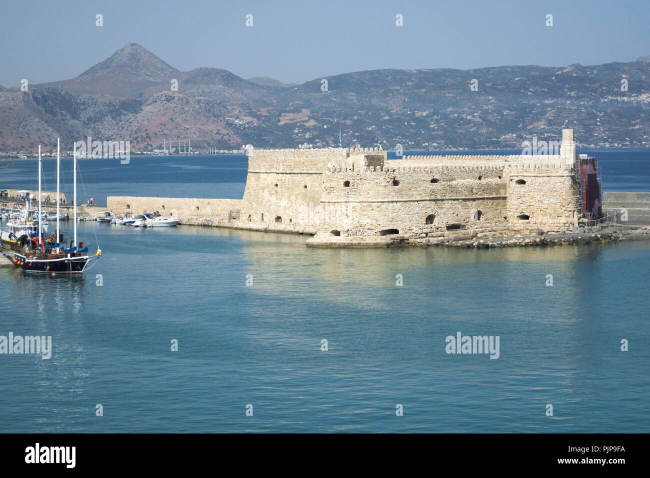 Greece, the beautiful island of Crete.  The Venetian Koules fortress at the entrance to the harbour. Stock Photo