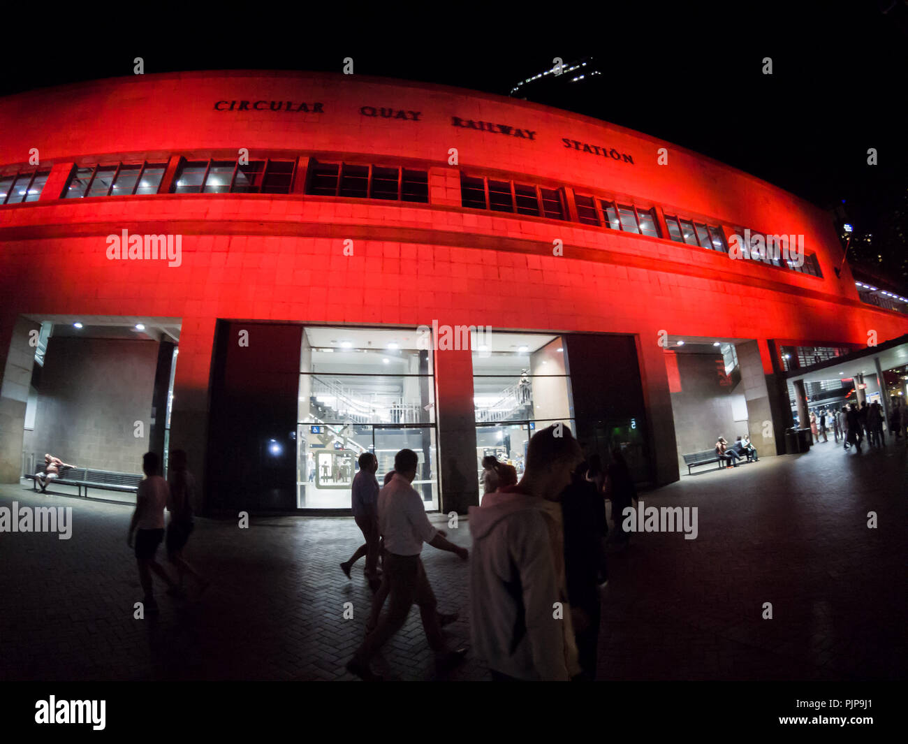 The City of Sydney in collaboration with Westpac is Painting the Town Red including Circular Quay railway Station, the sails of the Sydney Opera House, the Sydney Harbour Bridge, Sydney Town Hall and other buildings across the city. . Stock Photo