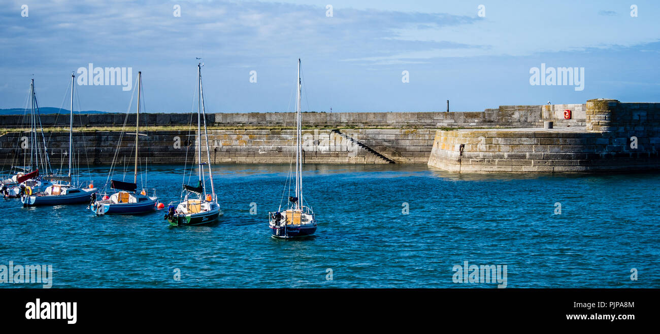 Donaghadee harbour with moored yachts Stock Photo