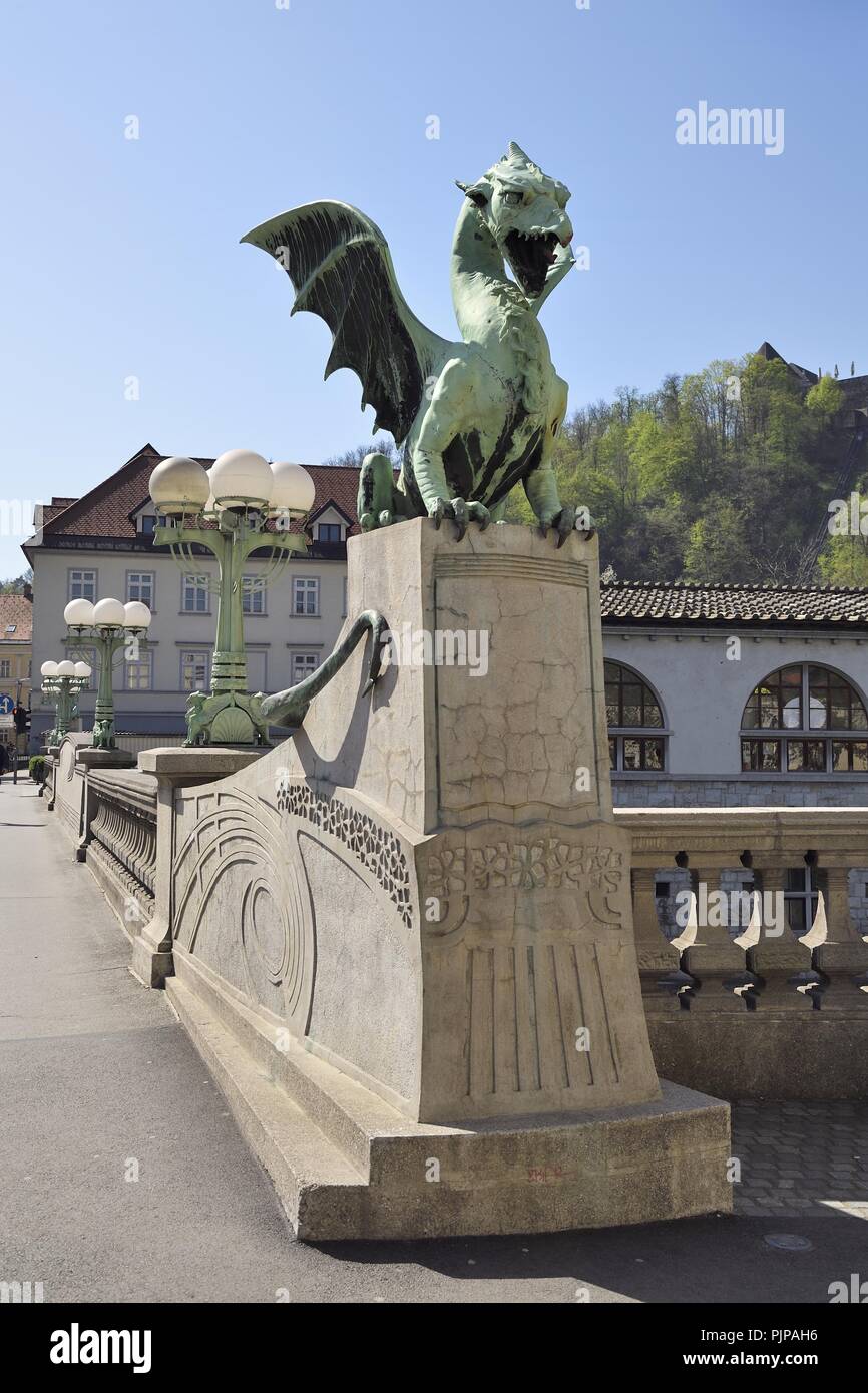 Bronze statue of a dragon on the Dragon Bridge, Zmajski Most, Ljubljana, Slovenia Stock Photo