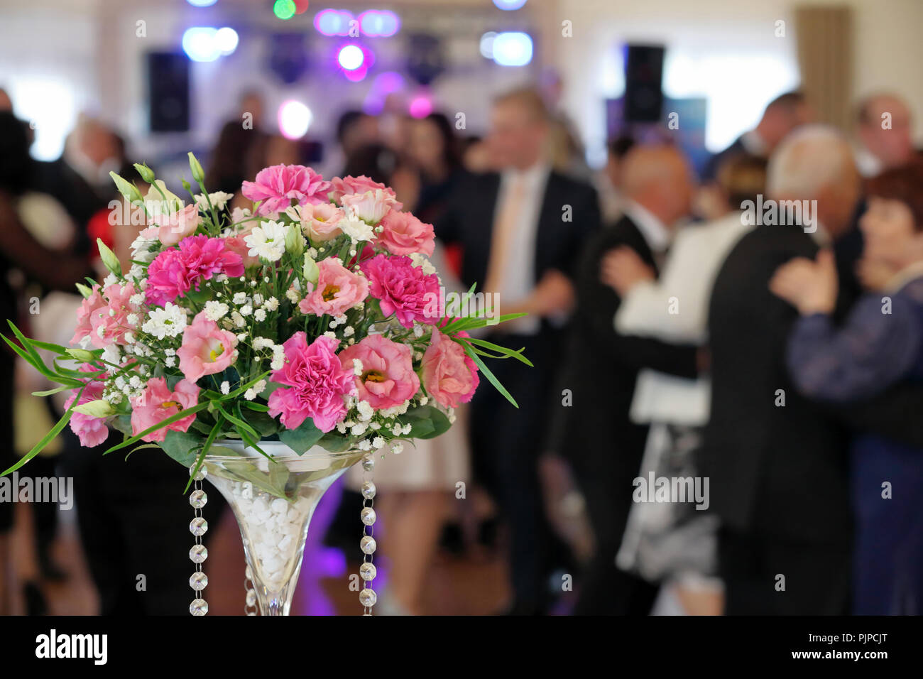 Dancing couples during party or wedding reception Stock Photo