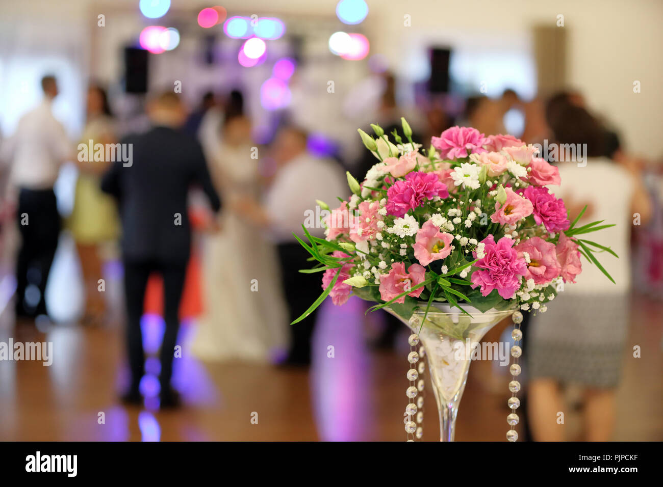 Dancing couples during party or wedding reception Stock Photo