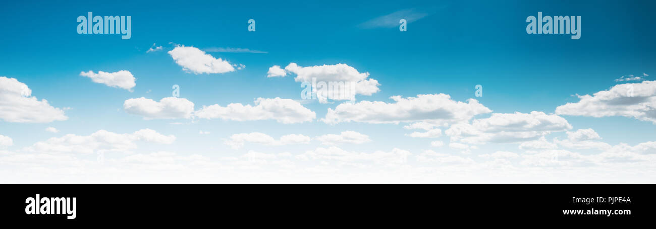 Clear blue sky and white clouds summer background Stock Photo - Alamy