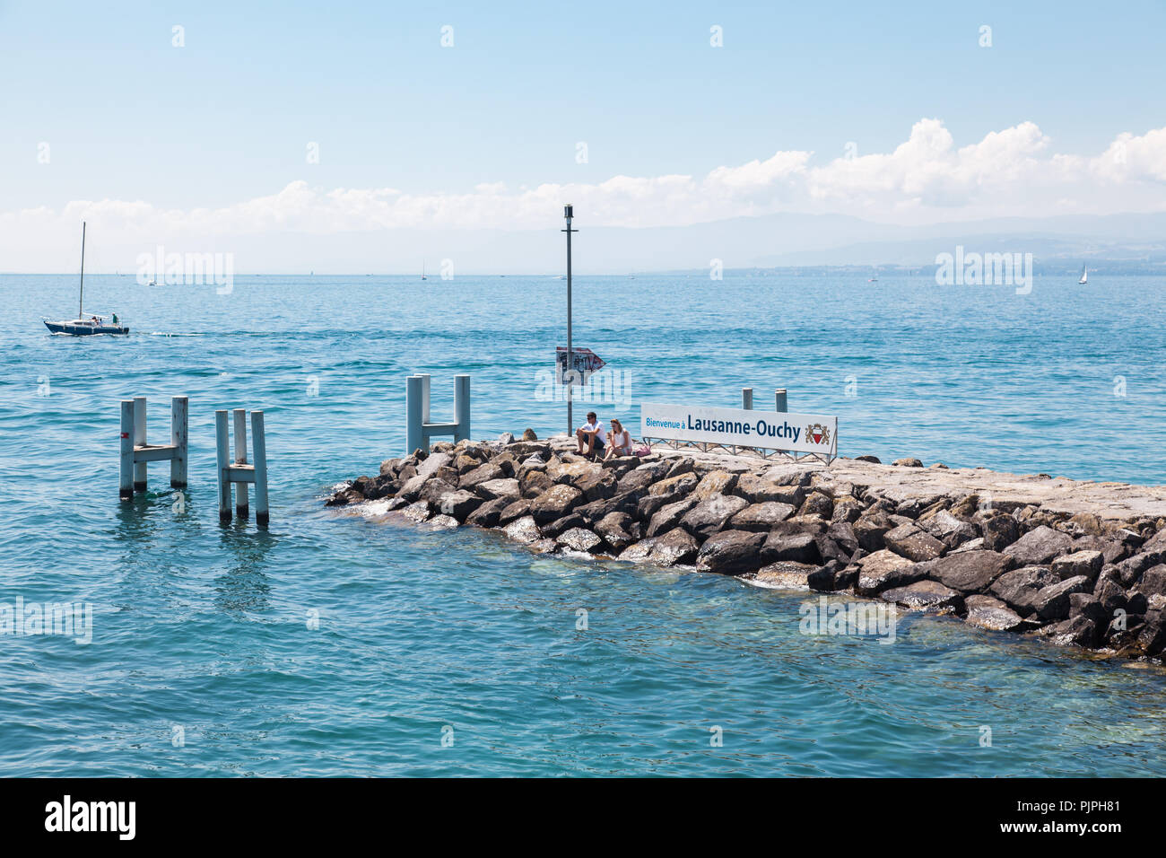 Welcome sign at entrance to Lausanne Ouchy port, Switzerland on Lake Leman (Geneva Lake) on sunny summer day Stock Photo