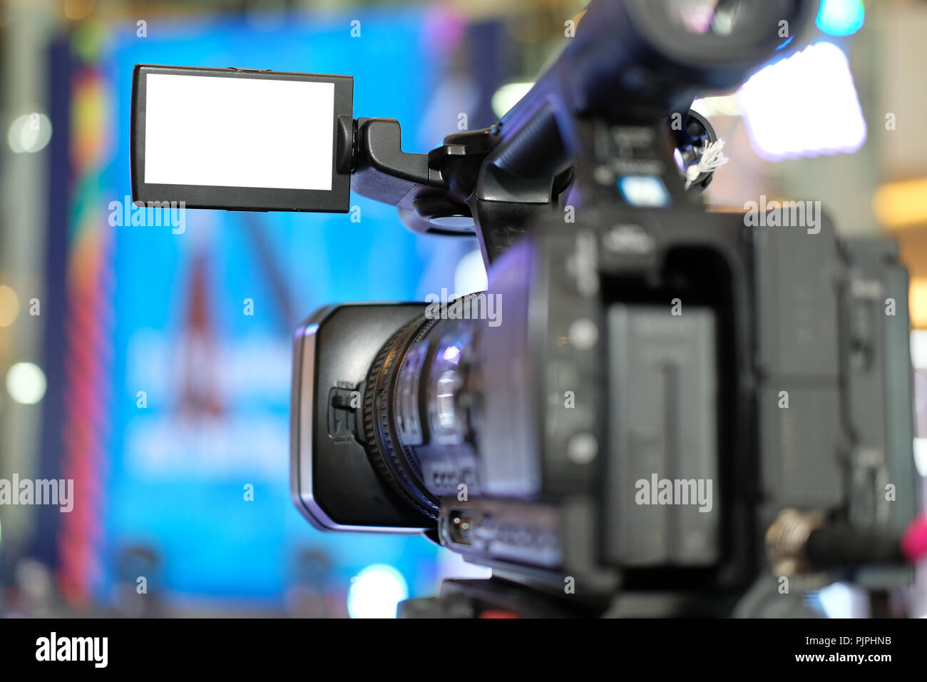 professional video production camera recording live event on stage