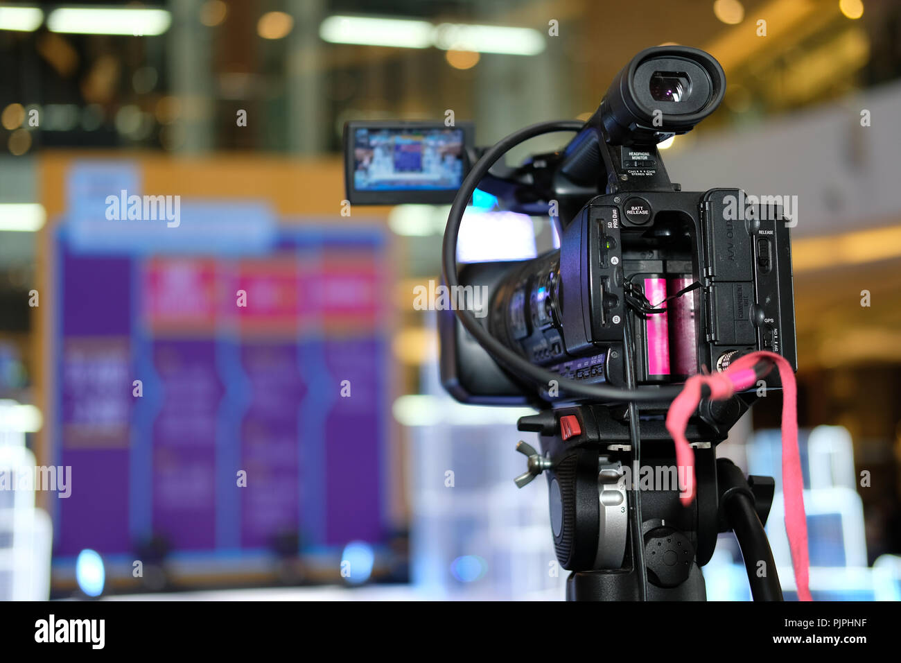 professional video production camera recording live event on stage