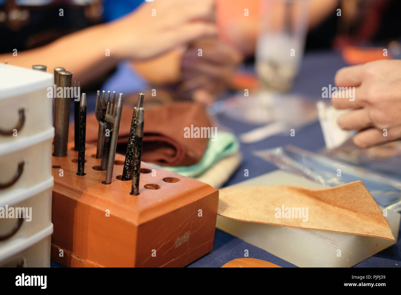 handmade leather craft DIY instrument tool. craftsman working desk