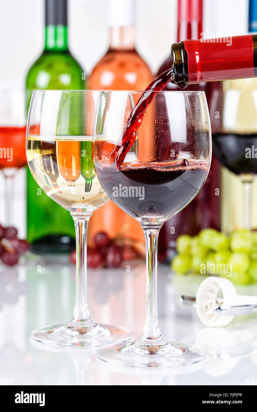 Wine pouring glass bottle portrait format red pour alcohol Stock Photo